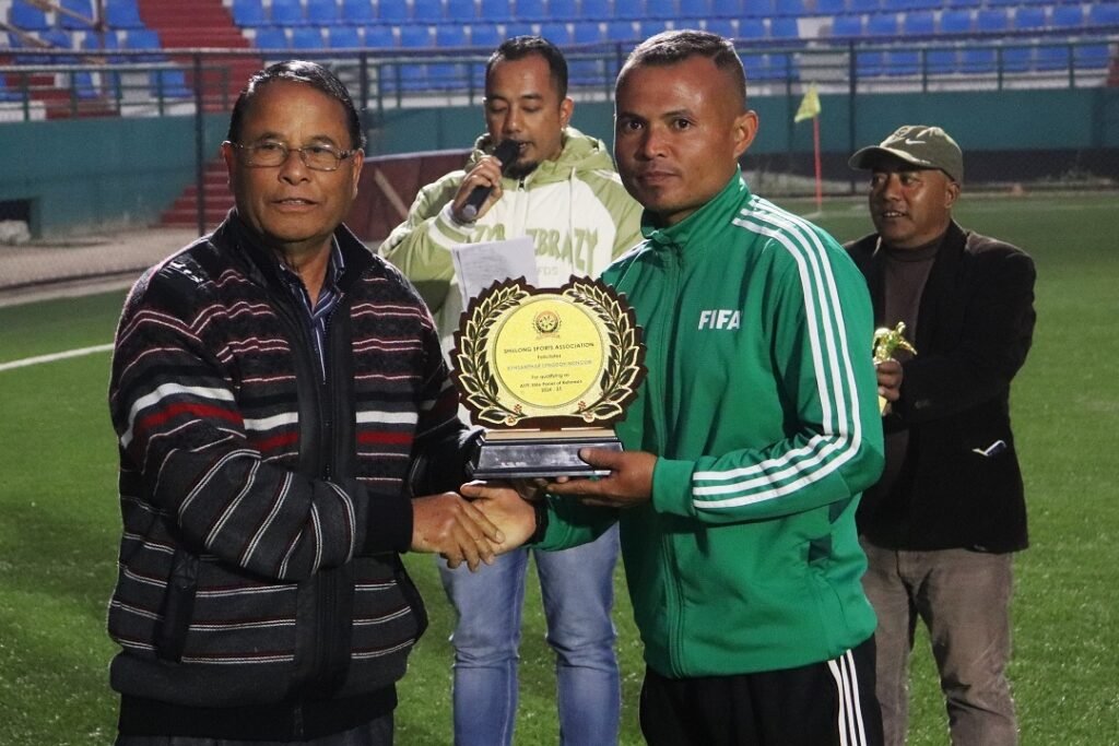 Referee Kynsanphar L Nongum (right) being felicitated