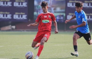 Shillong, Mar 5: Shillong Lajong FC remain in the hunt for the OC Blue Shillong Premier League 2024 title after defeating Rangdajied United 2-1 at the SSA Stadium at First Ground, Polo, here today. Samchaphrang Lato (27’) and Iohborlang L Lyngkhoi (45’P) provided the goals for Lajong and Benny Khriam (85’) for Rangdajied. Anything less than a win today would have handed the trophy to leaders Mawlai SC and the defending champions can still take a third consecutive OC Blue SPL title by winning their next fixture, which will be on 10 March. As it stands, Lajong have 42 points now, 2 behind Mawlai. Rangdajied are third with 32. The opening goal came from a right flank cross by Rimankhraw Kharumnuid. Deibormame Tongper headed it at the far side but the ball might have come off a defender as the header lacked power. Luckily for Lajong, it fell into an ideal spot for Samchaphrang to help it into the net with his left boot. Before half time Aibiangmame Nongneng carelessly gave the ball away to Deibor and he ran with it into the box. With no team mate left to back him up, Rangdajied goalkeeper Kerichard L Marshillong charged out and tackled the man and not the ball, leading to a penalty. Iohborlang converted this perfectly, slamming the ball high into the net. Uniquely for the teams in the SPL, Rangdajied have conceded more goals in the first half than the second - 8 to 3 - including five in the last three games. Rangdajied had their moments in the second half, with Owanijuh Pajuh heading a cross on target but straight to Lajong goalie Siwel Rymbai. RUFC had three bites from a corner kick later on, with two attempts blocked and the third sent wide by Aenam Jyrwa. It was substitute Benny Khriam who pulled a goal back, delightfully whipping a header from a chipped ball past Siwel. Ieitlang Syiemlieh was marginally wide two minutes later but an equaliser was not on the cards and Lajong took the win, which, incidentally, was by the same margin that they beat Rangdajied in the first leg in October. Tomorrow Ryntih FC will take on Nongrim Hills SC at 3pm. This will be the last fixture for both sides this season. A win or a draw would lift Nongrim Hills from eighth place to seventh. Nongrim Hills had won their first leg encounter against bottom club Ryntih 6-0 in December.