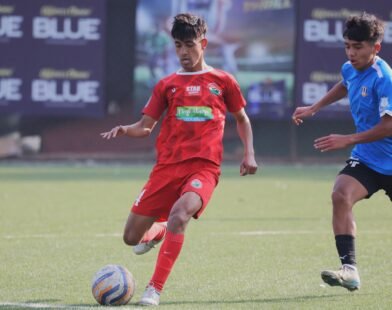 Shillong, Mar 5: Shillong Lajong FC remain in the hunt for the OC Blue Shillong Premier League 2024 title after defeating Rangdajied United 2-1 at the SSA Stadium at First Ground, Polo, here today. Samchaphrang Lato (27’) and Iohborlang L Lyngkhoi (45’P) provided the goals for Lajong and Benny Khriam (85’) for Rangdajied. Anything less than a win today would have handed the trophy to leaders Mawlai SC and the defending champions can still take a third consecutive OC Blue SPL title by winning their next fixture, which will be on 10 March. As it stands, Lajong have 42 points now, 2 behind Mawlai. Rangdajied are third with 32. The opening goal came from a right flank cross by Rimankhraw Kharumnuid. Deibormame Tongper headed it at the far side but the ball might have come off a defender as the header lacked power. Luckily for Lajong, it fell into an ideal spot for Samchaphrang to help it into the net with his left boot. Before half time Aibiangmame Nongneng carelessly gave the ball away to Deibor and he ran with it into the box. With no team mate left to back him up, Rangdajied goalkeeper Kerichard L Marshillong charged out and tackled the man and not the ball, leading to a penalty. Iohborlang converted this perfectly, slamming the ball high into the net. Uniquely for the teams in the SPL, Rangdajied have conceded more goals in the first half than the second - 8 to 3 - including five in the last three games. Rangdajied had their moments in the second half, with Owanijuh Pajuh heading a cross on target but straight to Lajong goalie Siwel Rymbai. RUFC had three bites from a corner kick later on, with two attempts blocked and the third sent wide by Aenam Jyrwa. It was substitute Benny Khriam who pulled a goal back, delightfully whipping a header from a chipped ball past Siwel. Ieitlang Syiemlieh was marginally wide two minutes later but an equaliser was not on the cards and Lajong took the win, which, incidentally, was by the same margin that they beat Rangdajied in the first leg in October. Tomorrow Ryntih FC will take on Nongrim Hills SC at 3pm. This will be the last fixture for both sides this season. A win or a draw would lift Nongrim Hills from eighth place to seventh. Nongrim Hills had won their first leg encounter against bottom club Ryntih 6-0 in December.