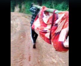 Villagers Carry Sick Man on Makeshift Stretcher as Lack of Road Leaves Nongkynrih Isolated