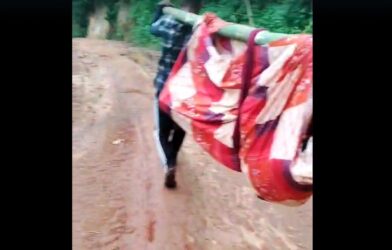 Villagers Carry Sick Man on Makeshift Stretcher as Lack of Road Leaves Nongkynrih Isolated