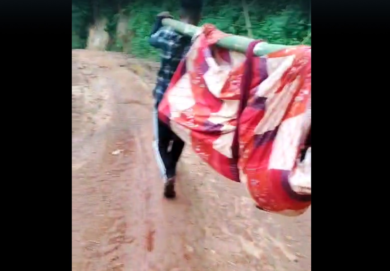 Villagers Carry Sick Man on Makeshift Stretcher as Lack of Road Leaves Nongkynrih Isolated